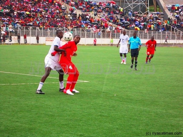 Gabadihno Mhango shielding the ball away from Pilirani Zonda...Photo By Jeromy Kadewere