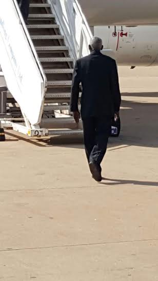 Giddes walking to board South African Airways