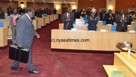 Finance Minister Goodall Gondwe walks in Parliament 