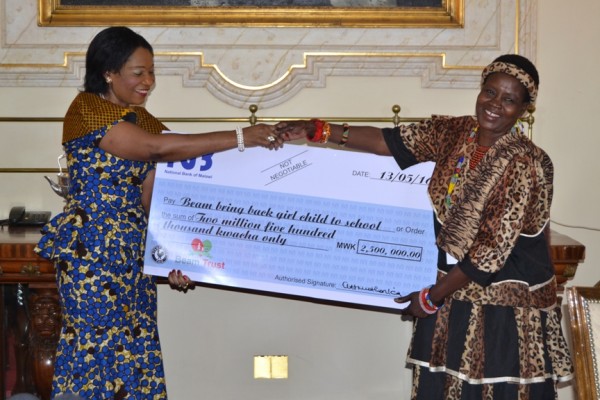 First Lady  Gertrude Mutharika, presents a cheque to BEAM Trust for Bring Back Girl Child to School,  Senior Chief Kachindamoto at Kamuzu Palace in Lilongwe-(c) Abel Ikiloni, Mana
