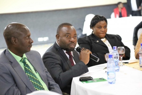 Hon. Chiwaya (Centre),commenting as a Catholic MP-Pix by Louis Suwedi (ECM-Media & Productions Officer)