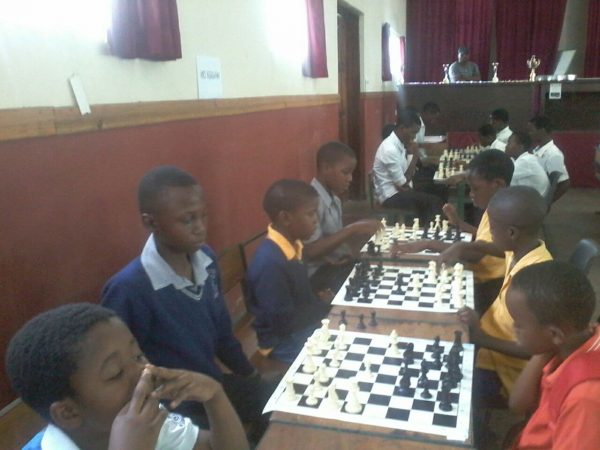 Kids participating in a  chess tournament