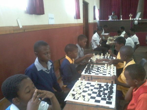 Kids participating in a chess tournament