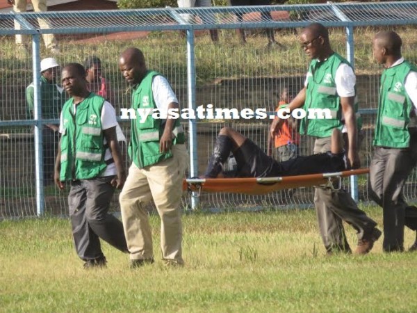 In agony- Malidadi Junior being stretchered off the field, Pic Alex Mwazalumo.