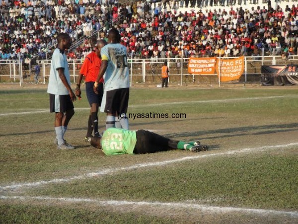 In agony, Silver goalie Swini after being fouled by Epac