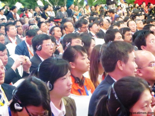 Invited guests listen to the speech by President Banda at the opening of the First China South Asia Exposition in Kumning, Yunnan Province on Thursday