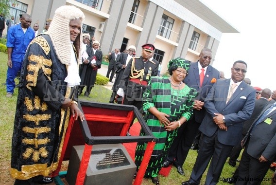 President Banda and Speaker Henry Chimunthu Banda after planting a tree before opening the 44th session of parliament