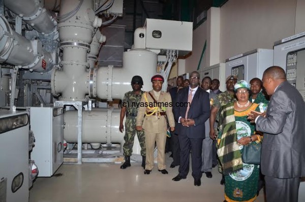 President Banda being briefed about the new power plant