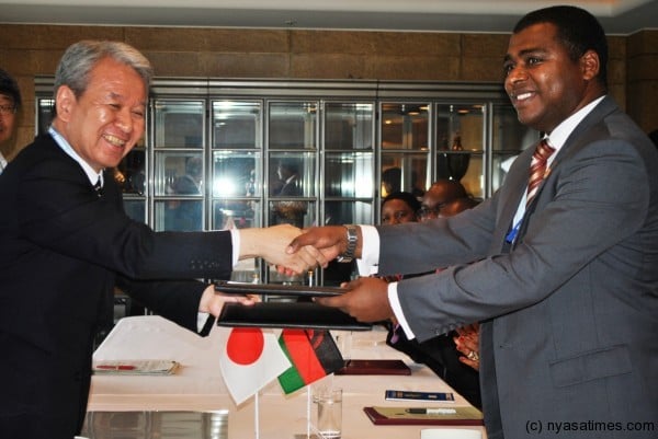 JICA President and Jooma exchange agreement documents