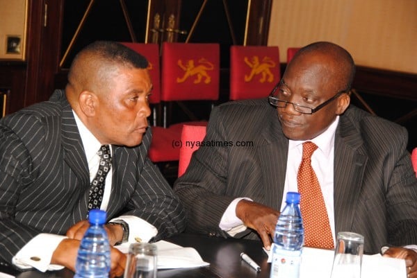 New Labour Party  president and former finance minister Friday Jumbe (right) with his aide Nicholous Kachingwe at the meeting