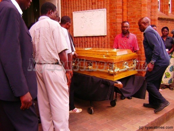 Jack Chamangwana welcoming the casket after mass ceremony___Photo Jeromy Kadewere