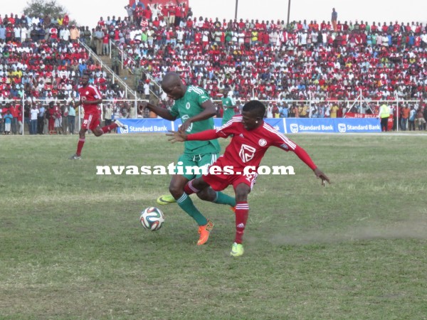 Jafali Chande, Moyale defender fight for the ball, Pic Alex Mwazalumo