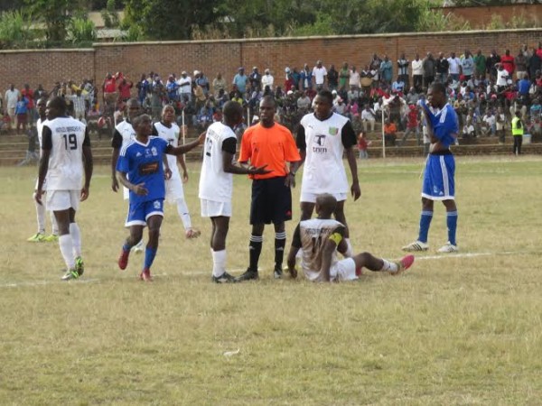 KB players protest to the ref as Harvey Nkacha goes down