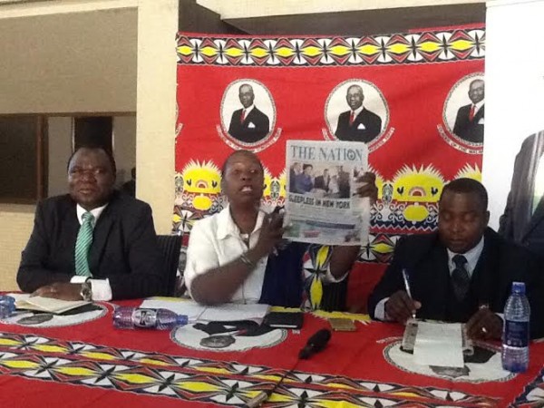 Kabwila showing reporters The Nation newspaper which reported Mutharika's New York 'Mapwevupwevu'