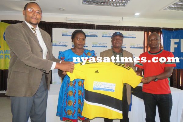 Kamuzu Barracks representative representative receiving their jersey-Jeromy Kadewere