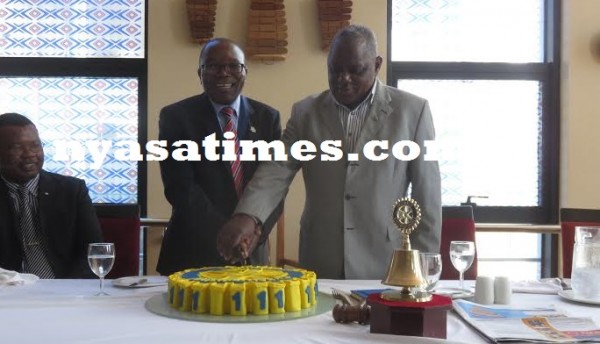 Kapenda, Lungu cut an anniversary cake.