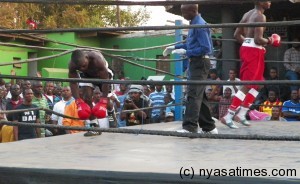 Kayuni gets up from the ropes after receiving a heavy punch, Pic Leonard Sharra, Nyasa Times