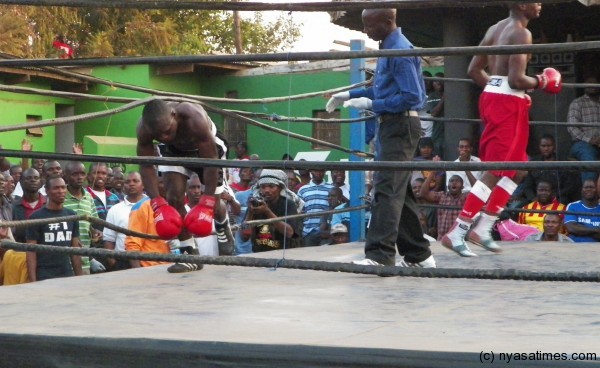 Kayuni gets up from the ropes after receiving a heavy punch, Pic Leonard Sharra, Nyasa Times