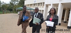 Kinnah (R) and his legal team leave Sports Council offices 