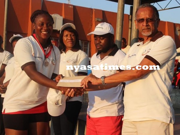 Kukoma Diamonds captain Carolin Ngwira receiving their prize money-..Photo Jeromy Kadewere