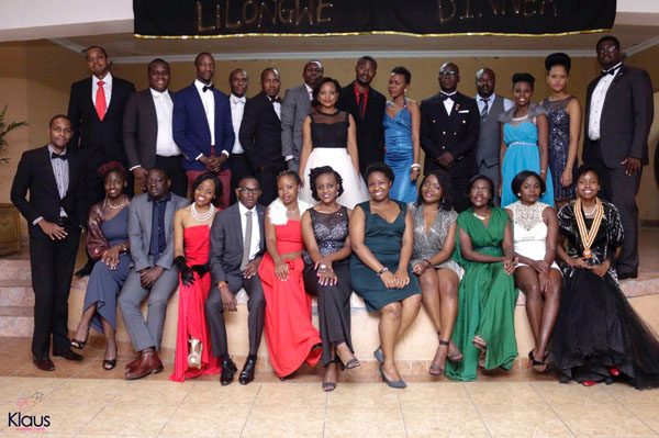 Kumwembe (front row far right), new board of directors and members. Photo by Klaus Media Corp