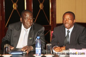 Labour Ministry PS James Kalilangwe (left) and other senior government officials attended the meeting