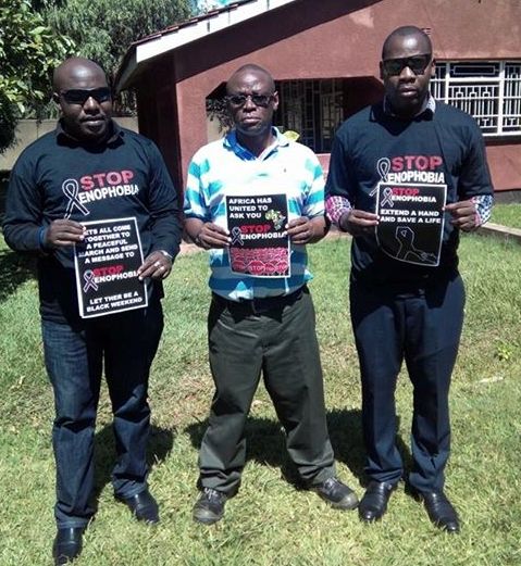 Left to right-Activists Timothy Mtambo Billy Mayaya and Gift Trapence getting ready for Tuesdays march - Pic by Donex Chisala