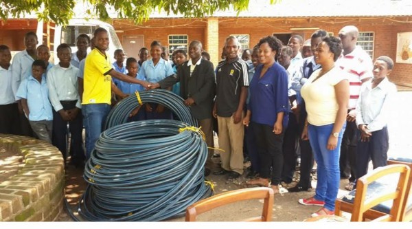 Luchenza Secondary School alumni donating PVC Pipes