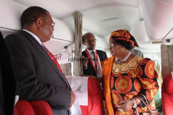 President Banda and Patridge inside a plane of a Malawian Arlines