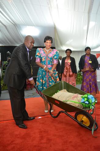 MBC Director General Aubrey Sumbuleta symbolically presents a donation to Madam Mutharika