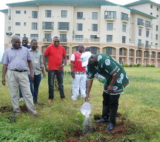 MRA Commissioner General Raphael Kamoto planting tree