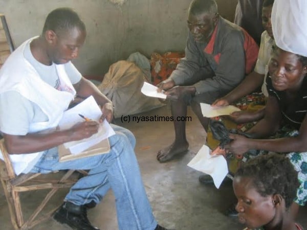 MSF registering people in health book
