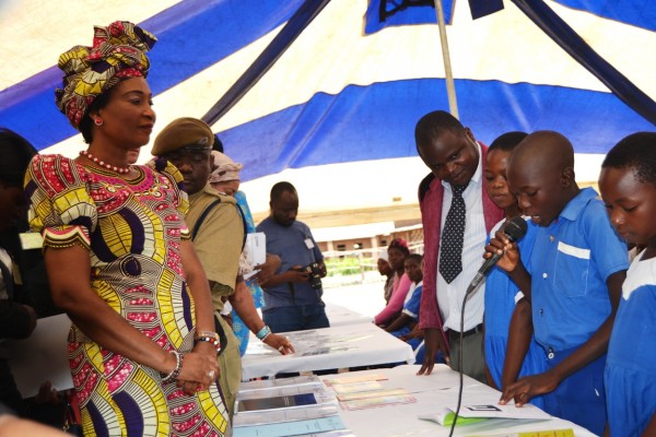 Madame Gertrude Mutharika verifies by listening from Nkhonde Primary School pupil`s reading in Balaka-(c) Abel Ikiloni, Mana