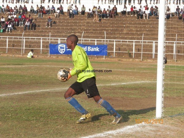 Mafco goalie Frank Kasiamo gets the ball, Pic Leonard Sharra, Nyasa Times