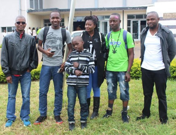 Makata left with four winners and TNM's Head of Innovations Frank Magombo (far left ) at Chileka airport before departure