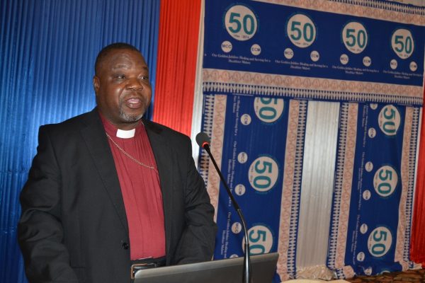 Malawi Council of Churches, Secretary General, Bishop Gilford Matonga gives his Opening remarks at the CHAM Annual General Conference Golden Jubilee at BICC, Lilongwe-(c) Abel Ikiloni, Mana
