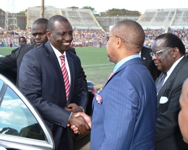 Malawi Vice President Saulos Chilima welcomes the Vice President of Kenya William Ruto on arrival at Kamuzu Stadium-Pic by Francis Mphweya