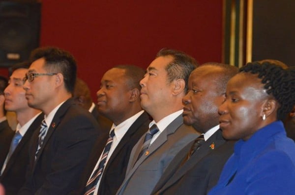 Malawi government officials and Chinese officials listeing to President Mutharka outlining the funded projects