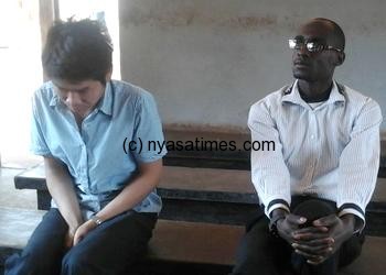 Chinese docked for ivory smuggling  , Axin Shang, left, and  acquitted suspect Mark Nyirenda,  (Photo © Charles Mkoka)