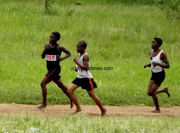 Malawi's top three female athletes running barefooted at Njamba Park- Pic Lucky Mkandawire.