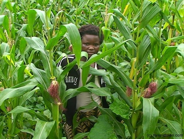 Malita shows off her maize field