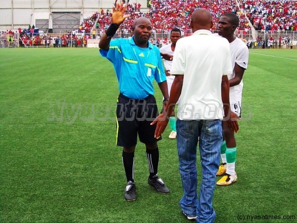 Mangasanja ordering a Moyale official to vacate the field of play.-Photo Jeromy Kadewere/Nyasa Times