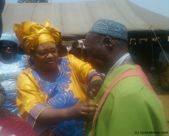 Minister of Local Government Grace Maseko(left) installing TA M'biza