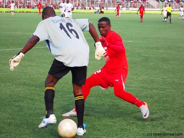 Gaba challenging Blantyre United goalkeeper....Photo Jeromy Kadewere