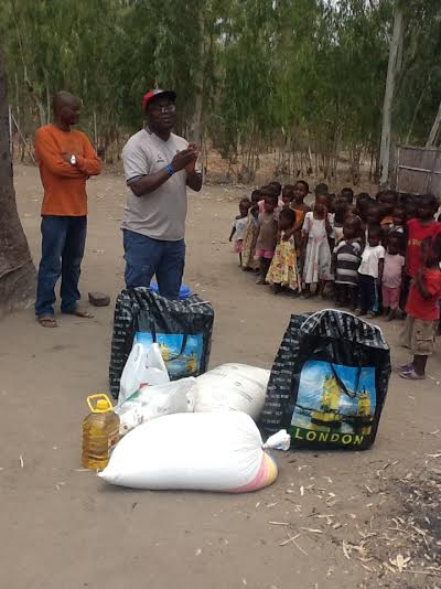 Mijiga speaking to the children