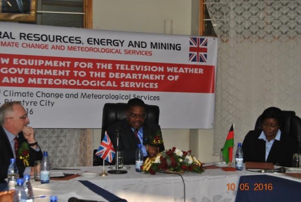 Minister of natural Resources, Energy and Mining, Bright Msaka delivering his speech after touring the news weather studio as Deputy British High Commissioner Martin Scales looks on.Picture By Tikondane Vega-