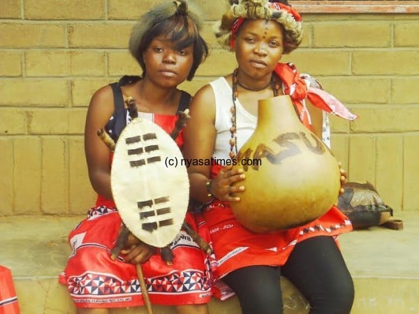 Modern ngoni girls holding a calabash used for drinking beer, water