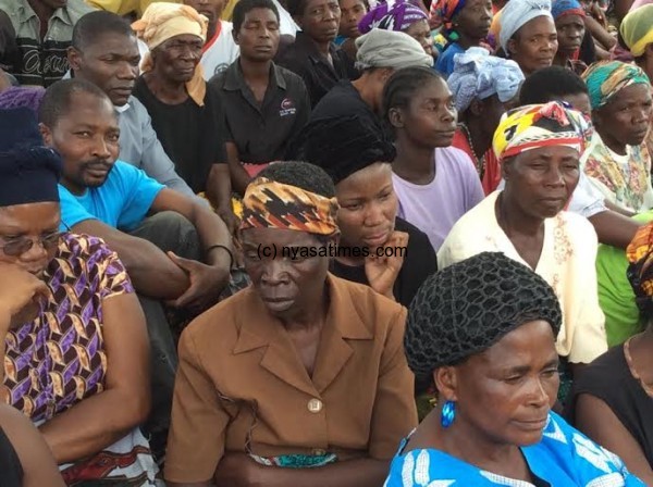 Mourners including Sports Minister Grace Chiumia in black.-Photo by Mphatso Nkhoma