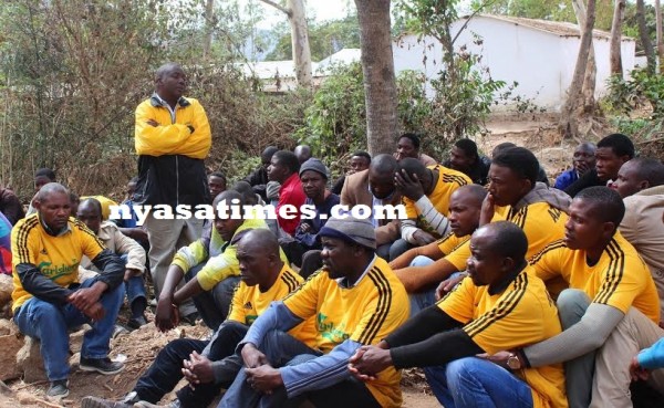 Mourning Mwase: Tigers team manager Alufnadika standing and former players