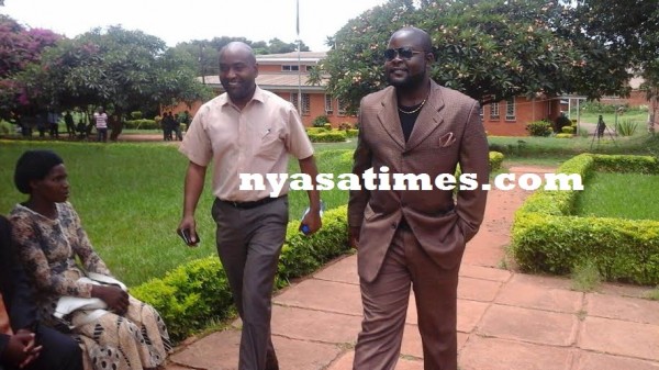 Mphwiyo (right) attended the court session, going home